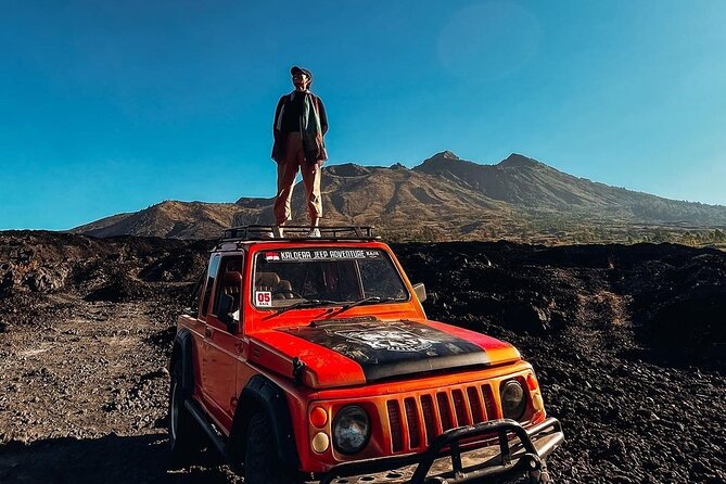 Mount Batur Jeep Sunrise & Hot Spring - All Inclusive Tour - The 1963 black lava field stop: volcanic scenery with a story