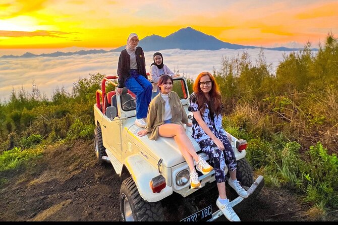 Mount Batur Sunrise Jeep Tour with Natural Hot Spring - After the sunrise: exploring black lava and learning the 1963 story